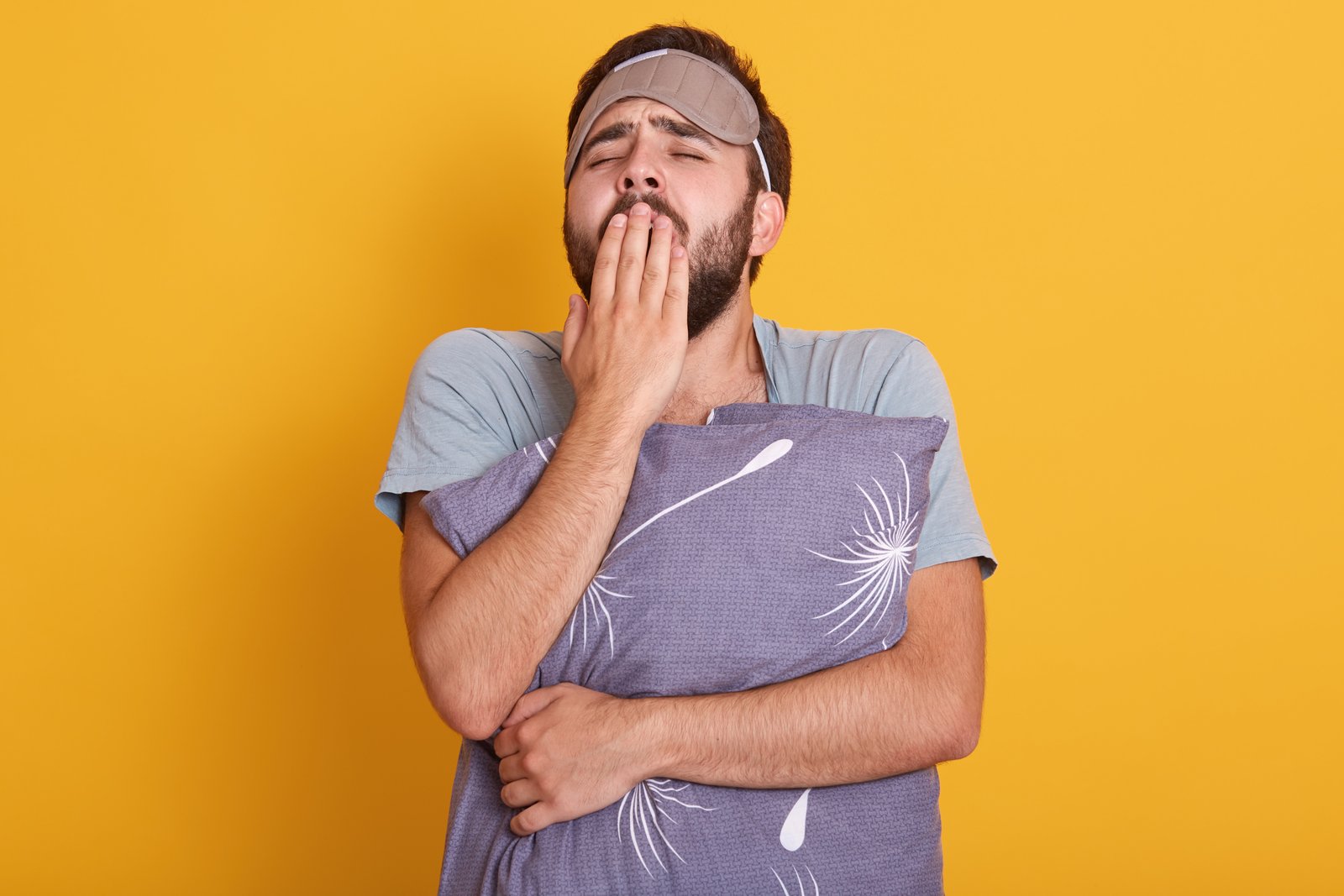 Tired professional exhausted at desk with brain fog