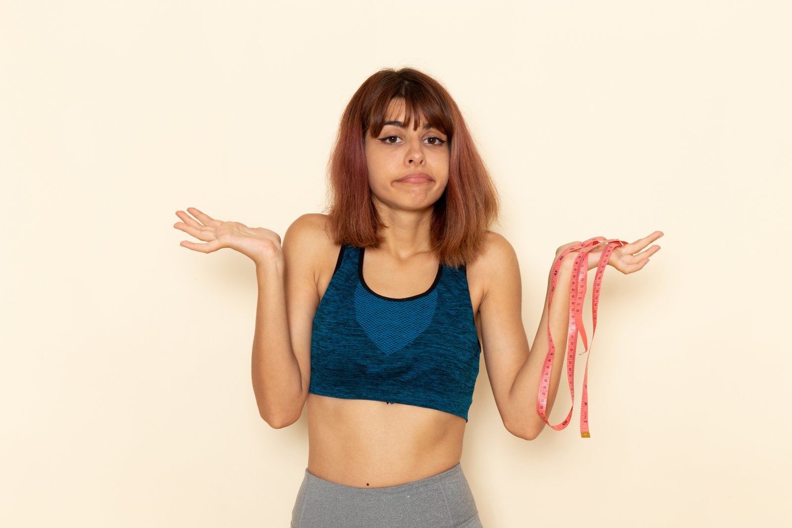 Frustrated woman on a weight loss plateau