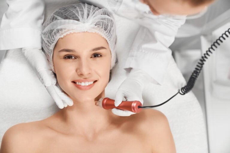 Smiling woman relaxing during a professional microdermabrasion facial at a Chicago med spa