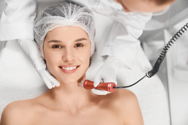 Microdermabrasion Facial Visit in Chicago Photo Smiling woman relaxing during a professional microdermabrasion facial at a Chicago med spa
