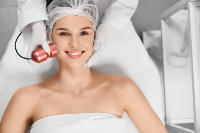 Happy woman during a gentle, customized microdermabrasion treatment at a Chicago med spa