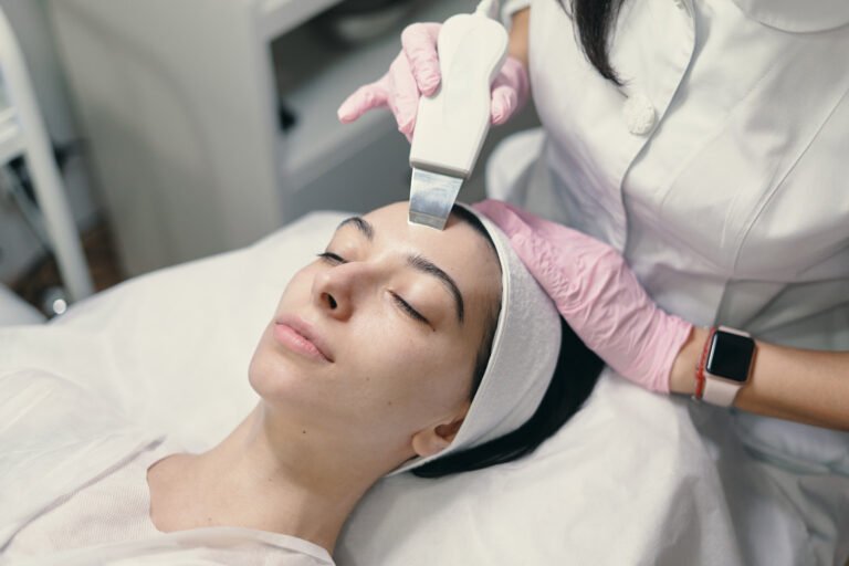 Microdermabrasion or Hydrating Facial Photo Woman relaxing during a professional facial to smooth rough skin texture