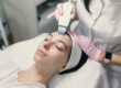 Woman relaxing during a professional facial to smooth rough skin texture