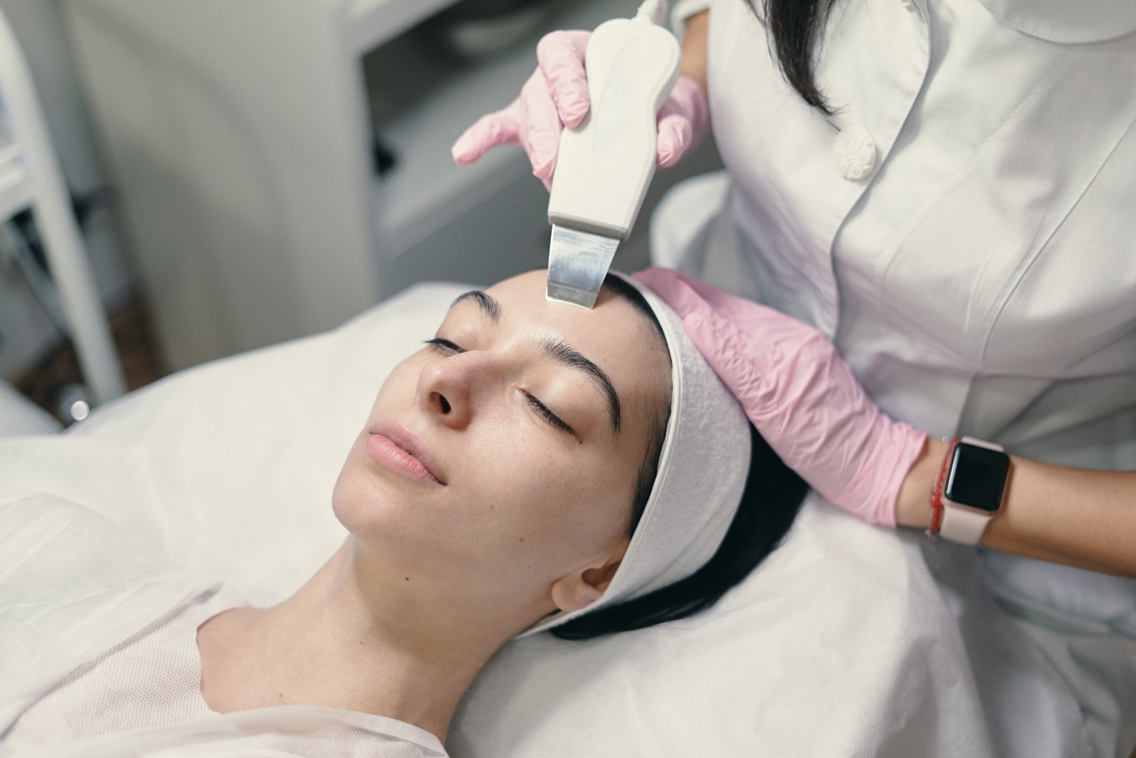 Microdermabrasion or Hydrating Facial Photo Woman relaxing during a professional facial to smooth rough skin texture