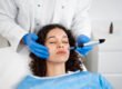 Relaxed patient having a professional microneedling treatment, a gentle option for healed surgical scars