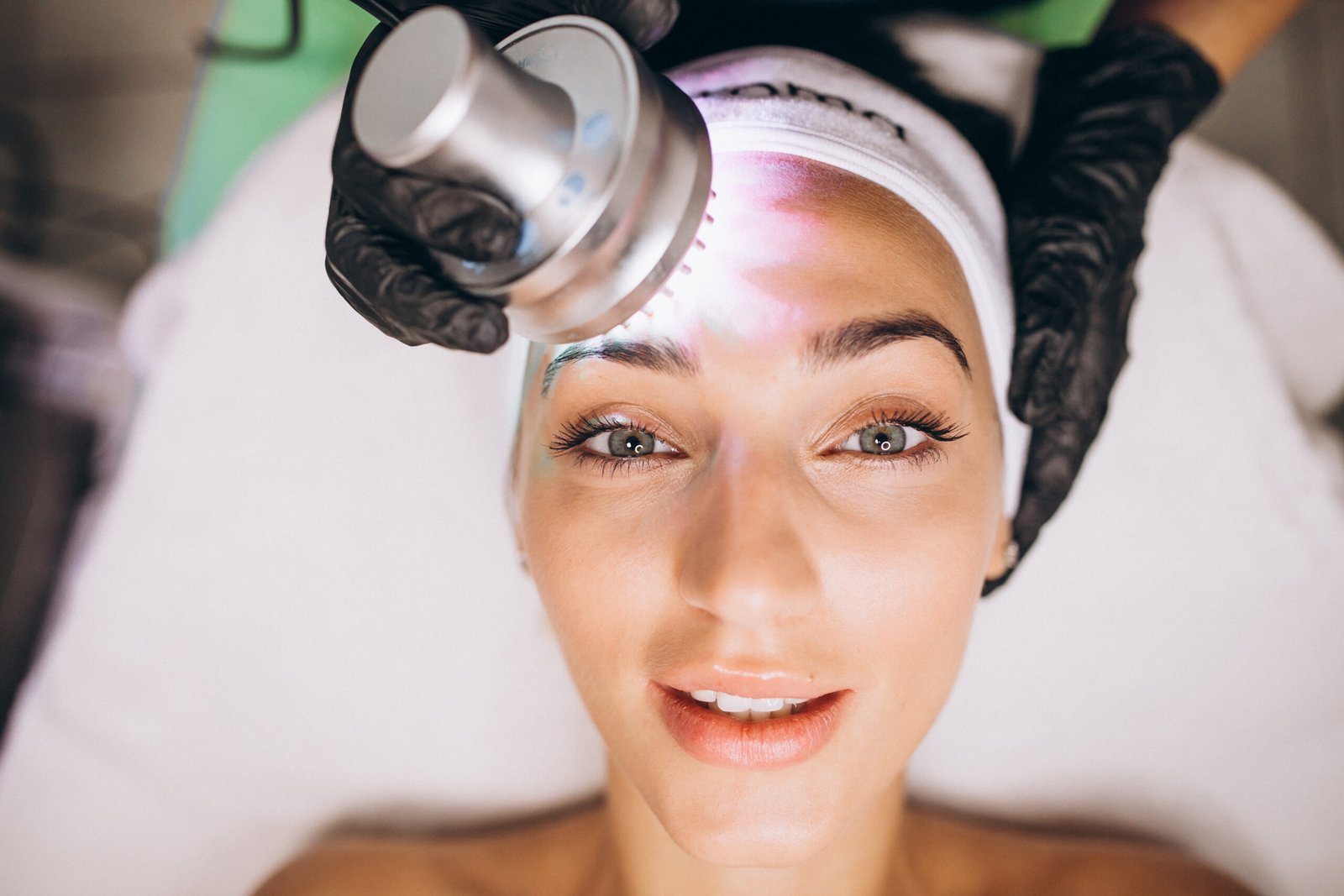 Professional Microdermabrasion After Home Device Photo Woman receiving a gentle professional microdermabrasion treatment after using an at home device