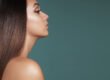 Side profile of a woman with a smooth, defined jawline