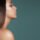 Side profile of a woman with a smooth, defined jawline