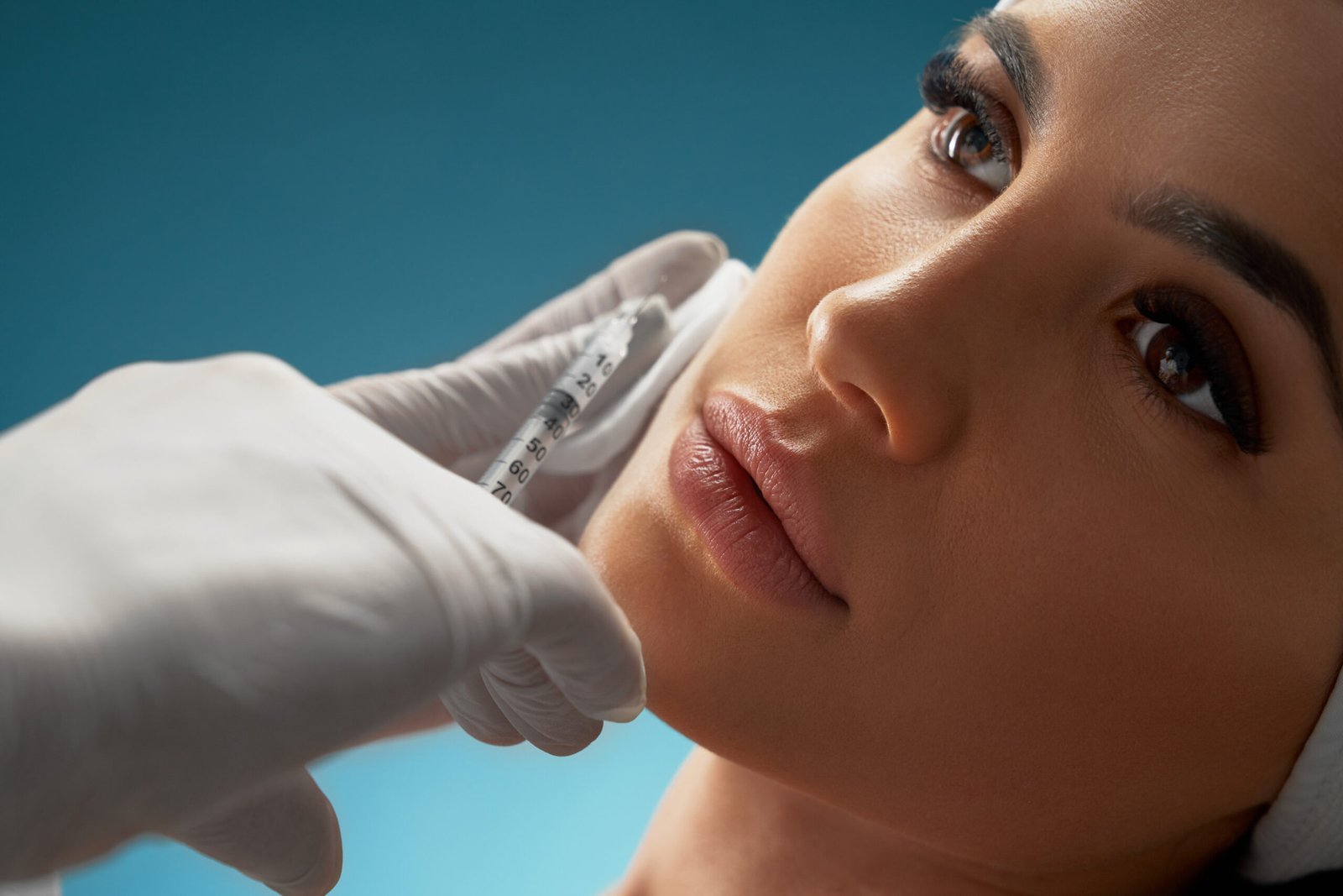 Sculptra for Lower Cheek Hollowing in Chicago Injector placing Sculptra in the lower cheek to restore volume and soften cheek hollowing at PURE Medical Spa Chicago