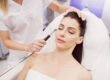 Relaxed woman receiving facial laser hair removal at a Chicago med spa