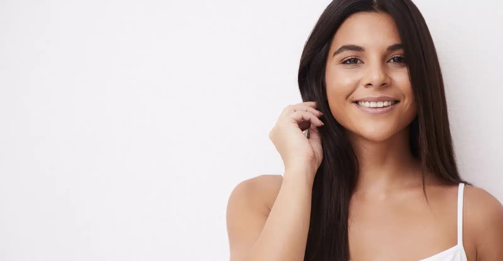 Smiling woman with clear, glowing skin after a VI Peel chemical peel Smiling woman with clear, glowing skin after a VI Peel chemical peel